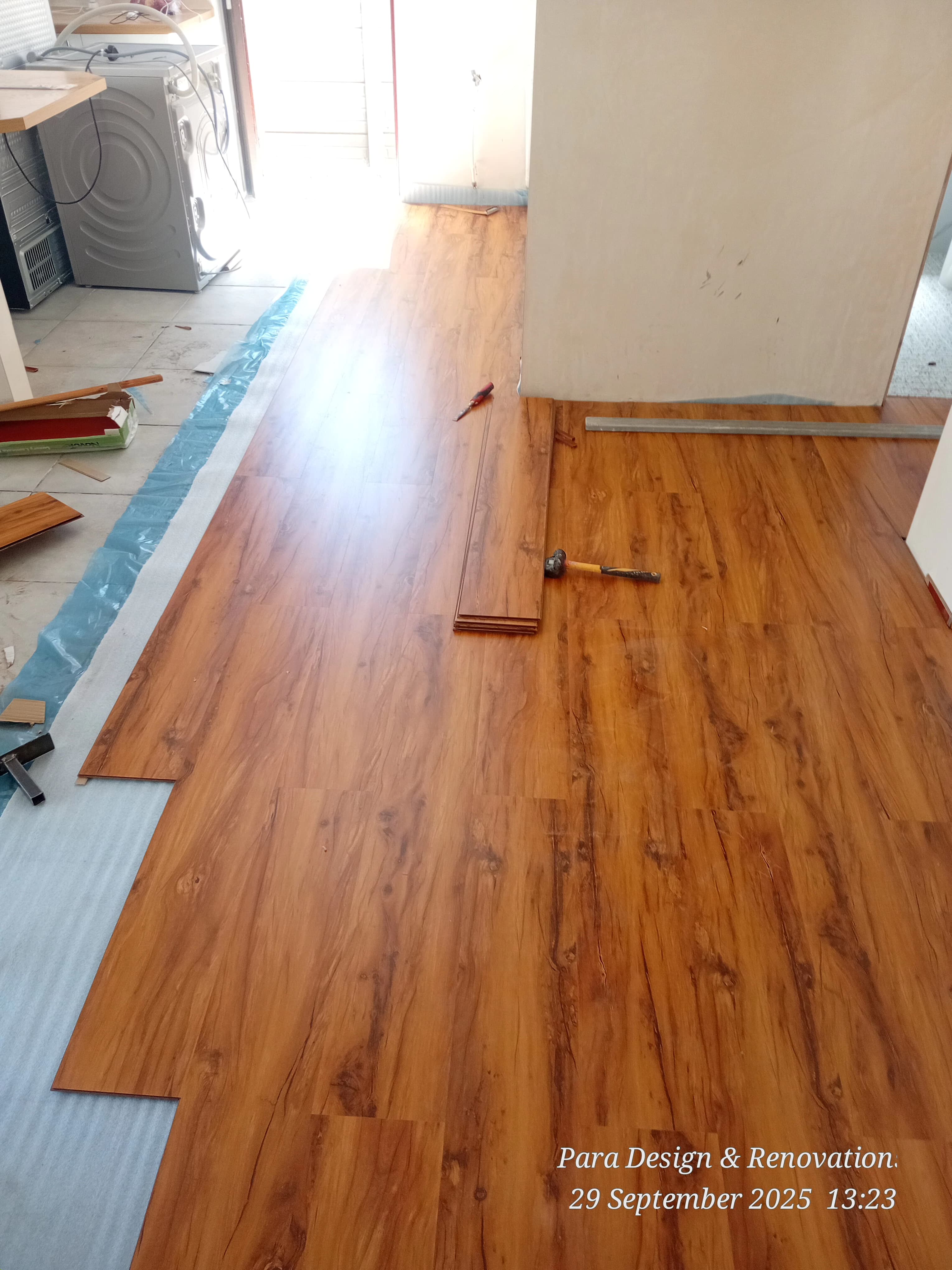 Retaining wall construction and waterproofing