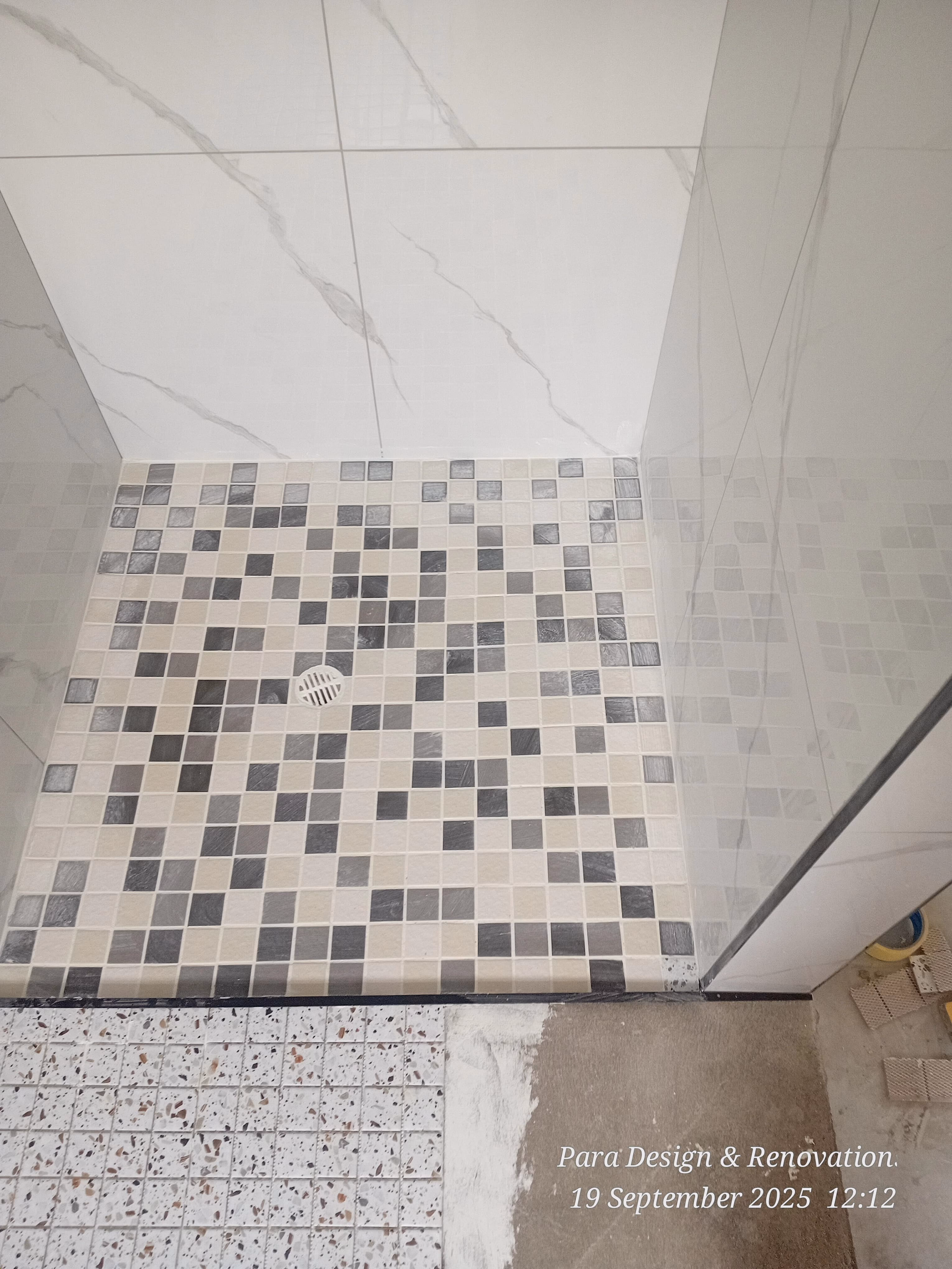 Feature wall tiling in modern bathroom